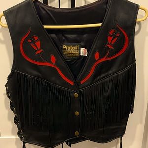 Beautiful leather vest. Size 10, maybe worn 3 times total. Gorgeous detail